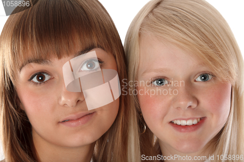 Image of Portrait two girls of the blonde and brunettes 