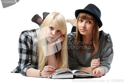 Image of Two girls lies and read books