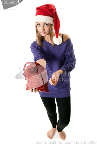 Image of Beautiful girl in red Santa hat