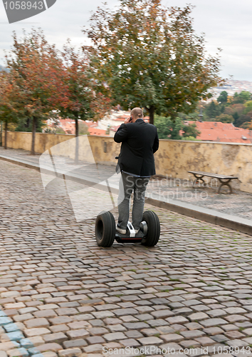 Image of A man rides on electric bike