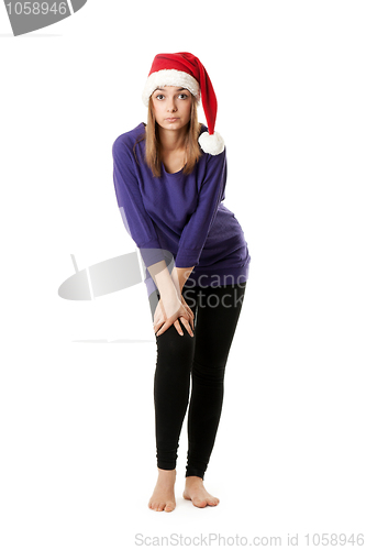 Image of Beautiful girl in red Santa hat