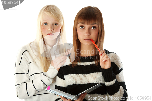 Image of Two beautiful girls read diary book