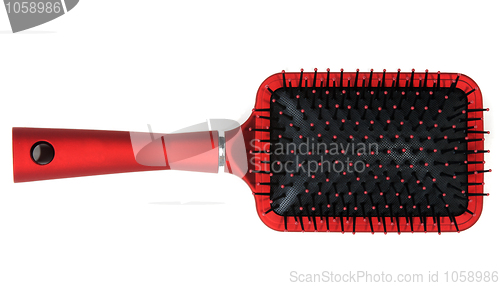 Image of One red massages comb