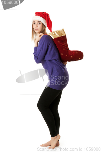 Image of Beautiful girl in red Santa hat 