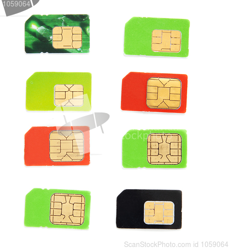 Image of Eight colorful sim card on a white background