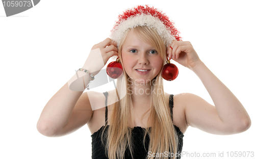 Image of Beautiful blonde girl in a Santa hat