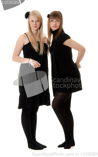 Image of Two girls in black dresses