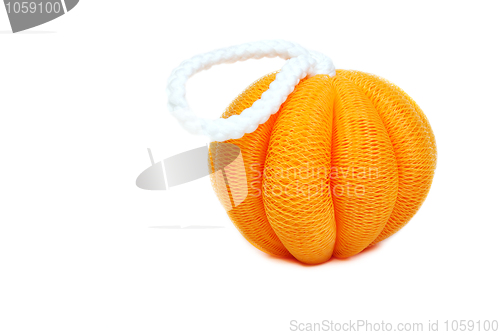 Image of Yellow sponge in the shape of a pumpkin