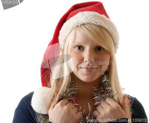 Image of A beautiful young blonde in a Santa hat
