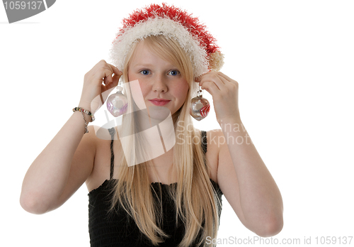 Image of Beautiful blonde girl in a Santa hat