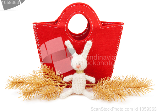 Image of Red bag and knitted hare