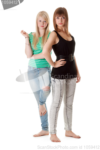 Image of Two girls in jeans