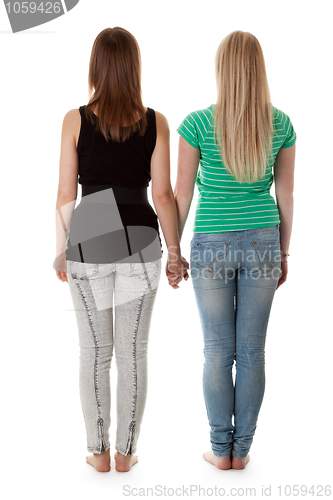 Image of Two girls in jeans