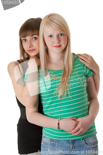 Image of Two girls in jeans