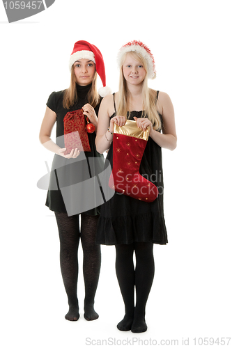 Image of Two girls in the Santa hat