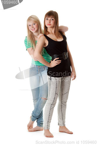 Image of Two girls in jeans