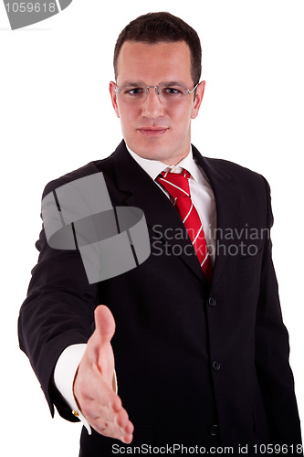 Image of handsome business man, with the arm extended for a handshake