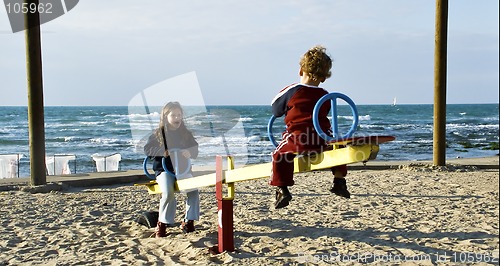 Image of swing on the beach