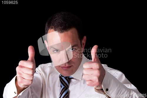 Image of businessman giving consent, with thumb up