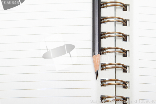 Image of A diary and a pencil