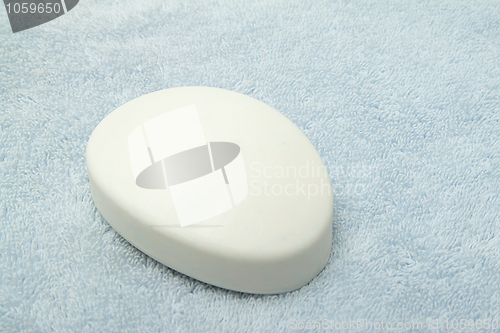 Image of White soap on a towel