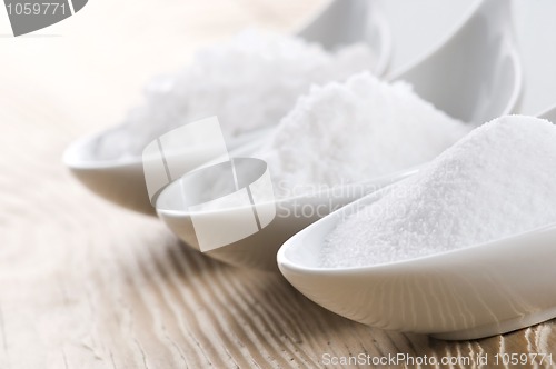 Image of three spoons with difrent salt