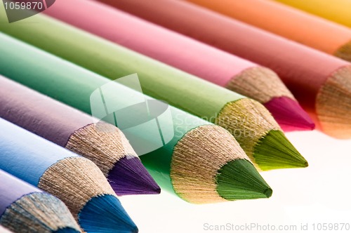 Image of Collection of colorful pens over white background