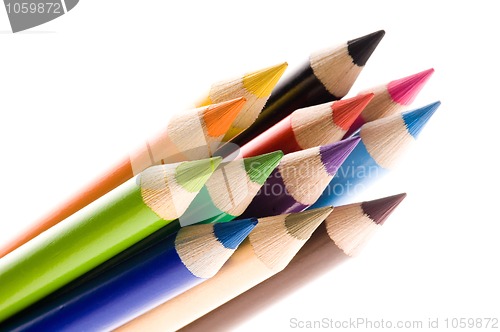 Image of Collection of colorful pens over white background