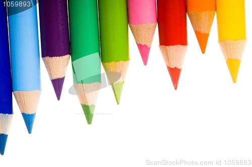 Image of Collection of colorful pens over white background