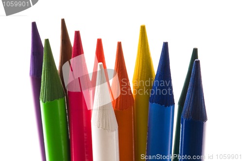 Image of Collection of colorful pens over white background