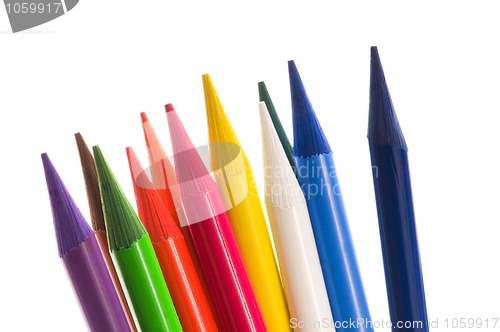 Image of Collection of colorful pens over white background