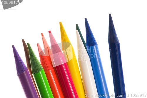Image of Collection of colorful pens over white background