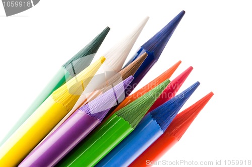 Image of Collection of colorful pens over white background