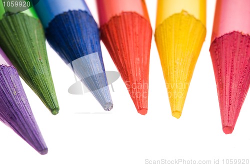 Image of Collection of colorful pens over white background