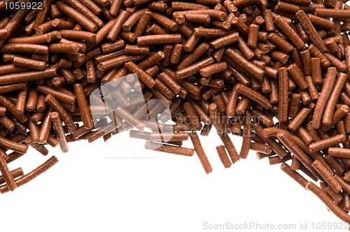 Image of chocolate sprinkles on white background