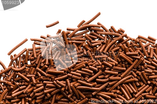 Image of chocolate sprinkles on white background