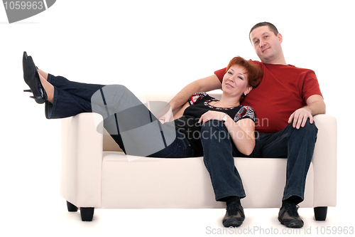 Image of Man and woman on a sofa