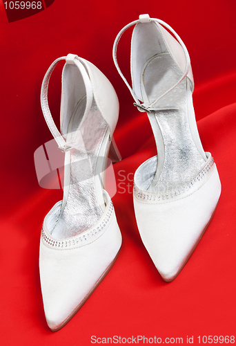 Image of Pair of white women's shoes