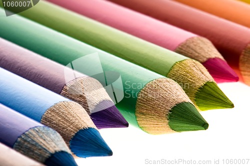 Image of Collection of colorful pens over white background