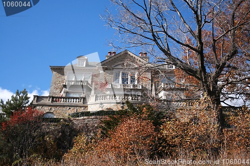 Image of two story stone house