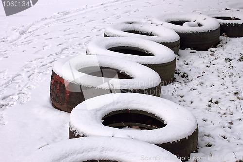 Image of Fragment of the row old tires