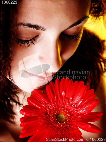 Image of Girl with a red flower