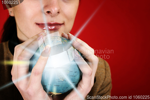 Image of Globe in a girl's hands