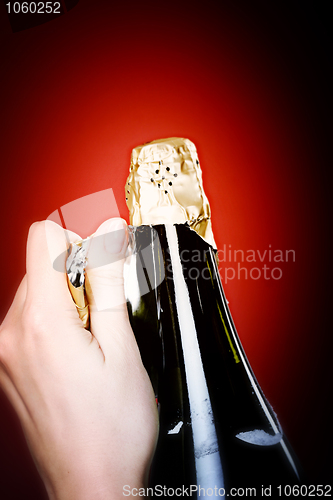 Image of Opening champagne bottle