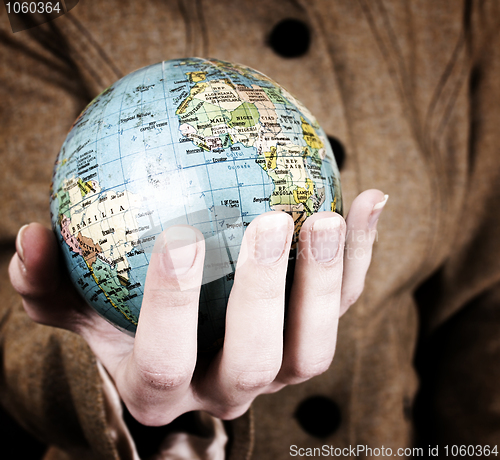 Image of Globe in a girl's hands