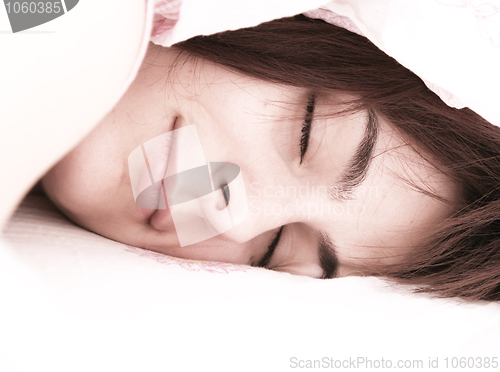Image of Beautiful young woman sleeping.