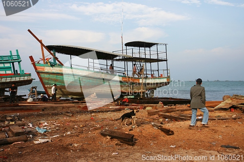 Image of Fixing a fishing boat