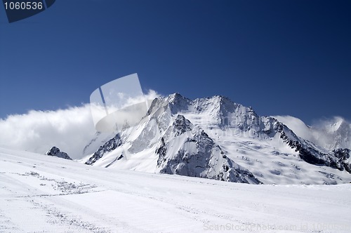 Image of Ski slope against mountains