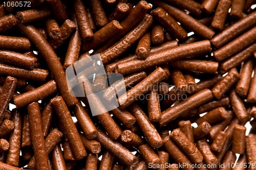 Image of chocolate sprinkles on white background
