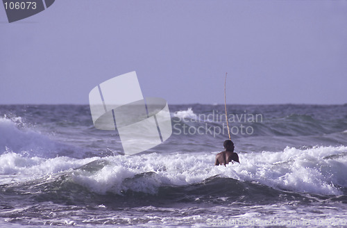 Image of Black man in the sea